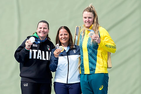 Women's Trap: Gold medalist Guatemala's Adriana Oliva Ruano, center, silver medalist Italy's Silvana Maria Stanco, left, and bronze medalist Australia's Penny Smith